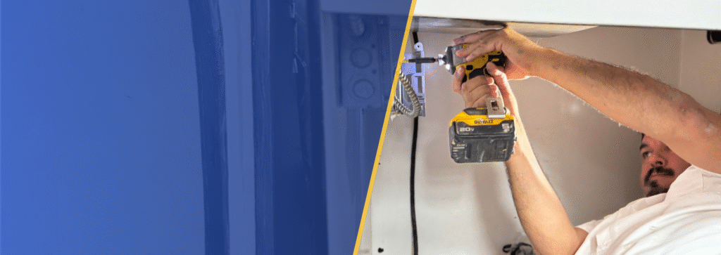 Electrician providing ceiling fan installation service